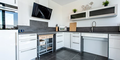 Rollstuhlgerechte Unterkunft - Unterkunftsart: Ferienhaus - Küche - Duinvallei 22