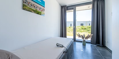Rollstuhlgerechte Unterkunft - Unterkunftsart: Ferienhaus - Schlafzimmer - Duinvallei 22