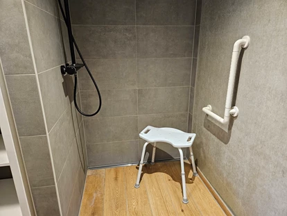 Rollstuhlgerechte Unterkunft - Unterkunftsart: Ferienhaus - Erdhausapartment WEST
