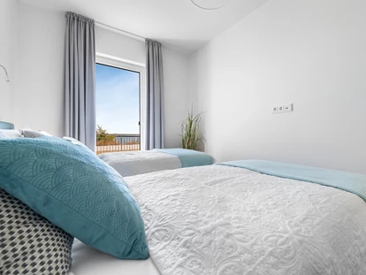 Rollstuhlgerechte Unterkunft - Schlafzimmer mit zwei Einzelbetten - Ocean Terrace