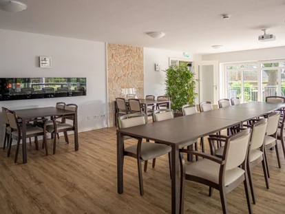 Rollstuhlgerechte Unterkunft - Unterkunftsart: Ferienhaus - Haus 1 - Wintergarten - Stiftung Friedrich Wilhelm und Monika Kertz