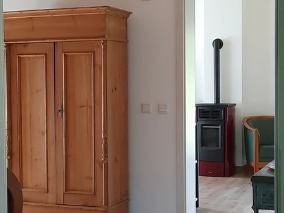 Rollstuhlgerechte Unterkunft - Unterkunftsart: Ferienhaus - Blick vom Flur in den Wohnraum. - Ferienhaus Wollinger