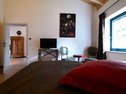 Rollstuhlgerechte Unterkunft - Unterkunftsart: Ferienhaus - zweites Fernsehgerät im Schlafzimmer - Ferienhaus Wollinger