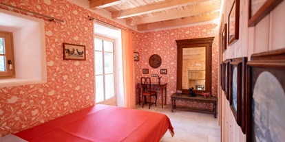 Rollstuhlgerechte Unterkunft - Pflegebett - Wohnung Paul - Schlafzimmer - Haus Himmelfahrt